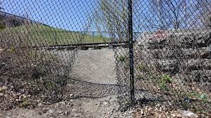 broken chain link fences and gates repair